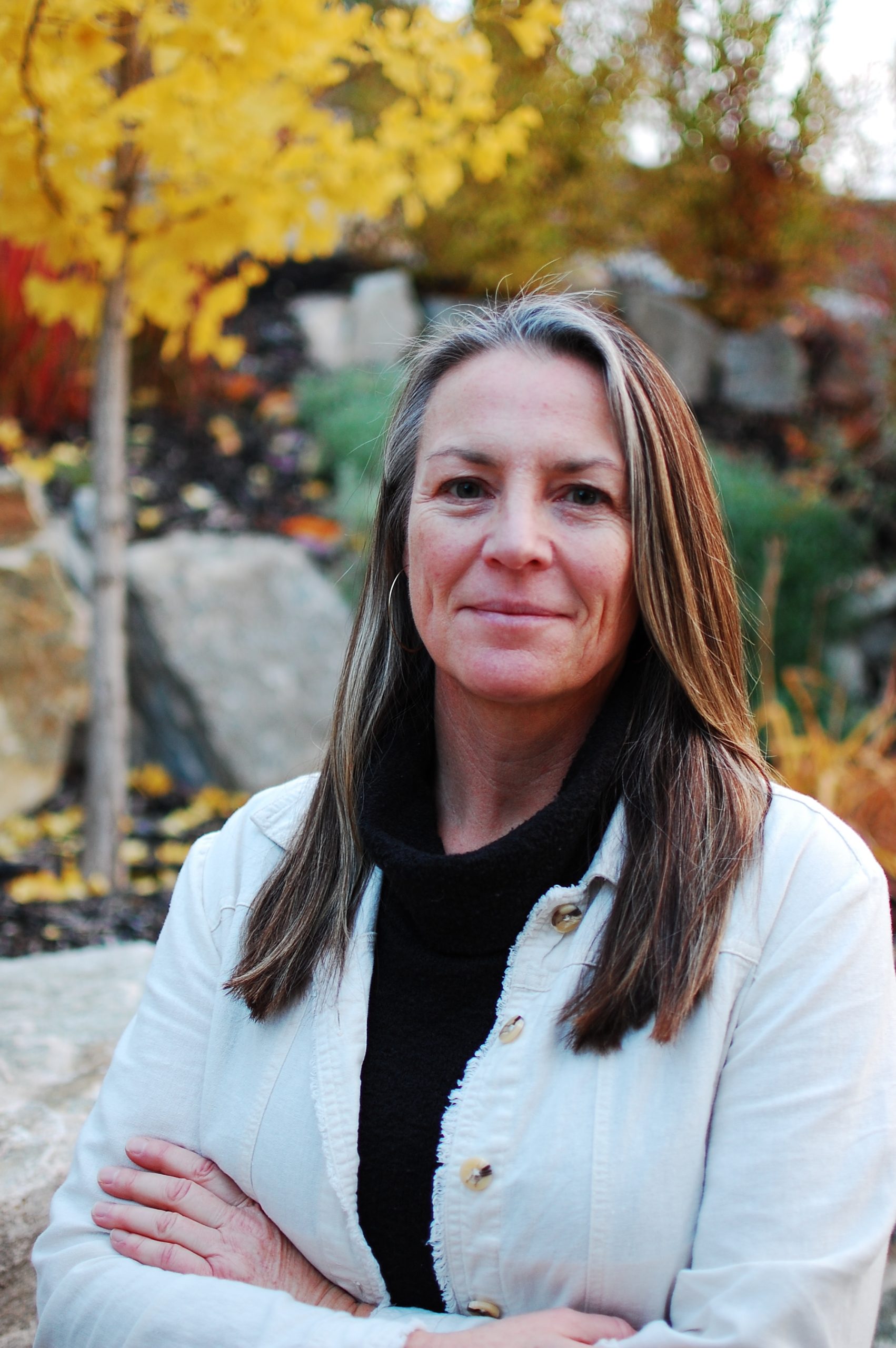 Portrait of Nicola Nuttgens, founder of Modterra, outdoors in autumn light.